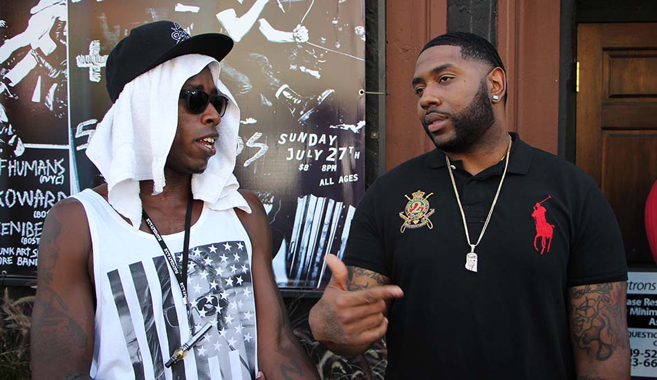 Aspect One and Aye Verb chop it up outside the venue.
